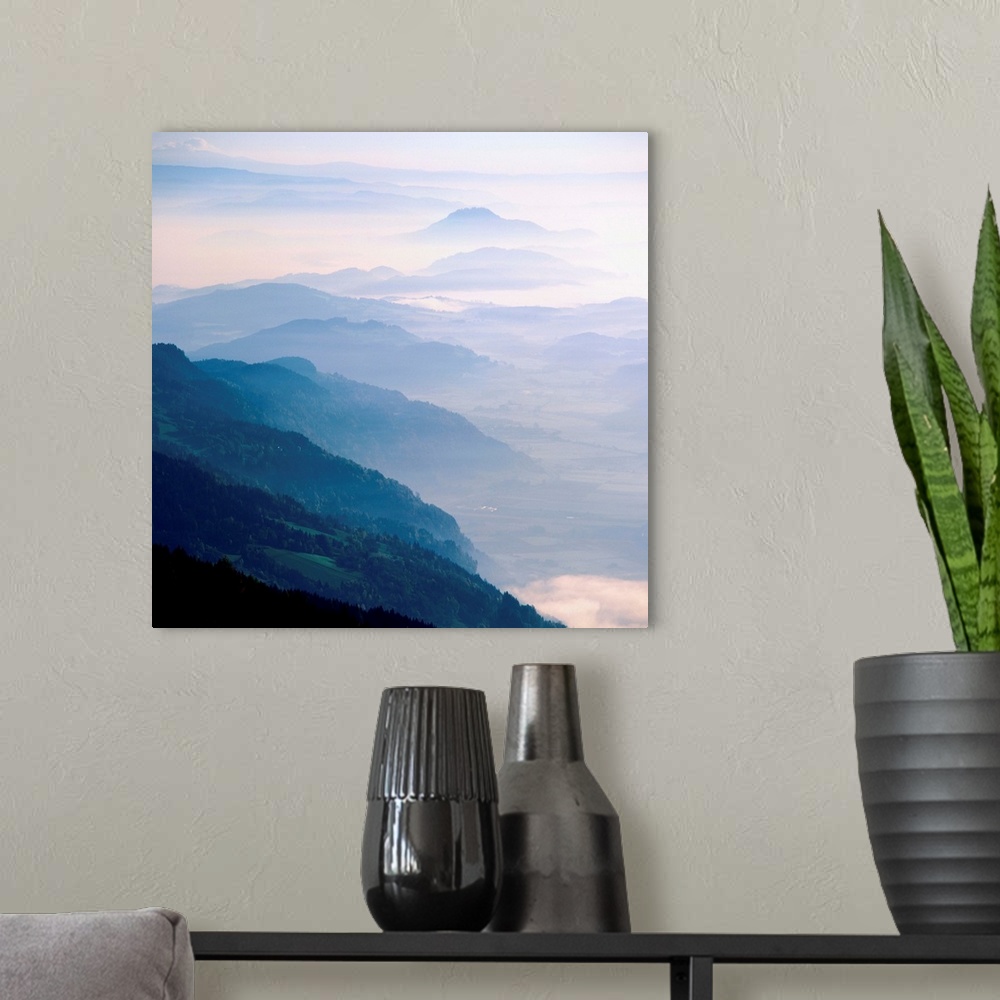 A modern room featuring Mountains and hills in mist