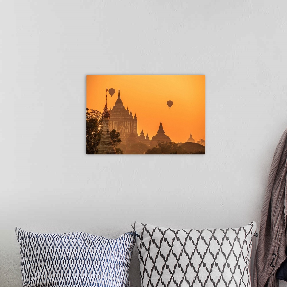 A bohemian room featuring Myanmar, Mandalay, Bagan, Hot air balloons over Gawdawpalin Temple at sunrise. This is the second...
