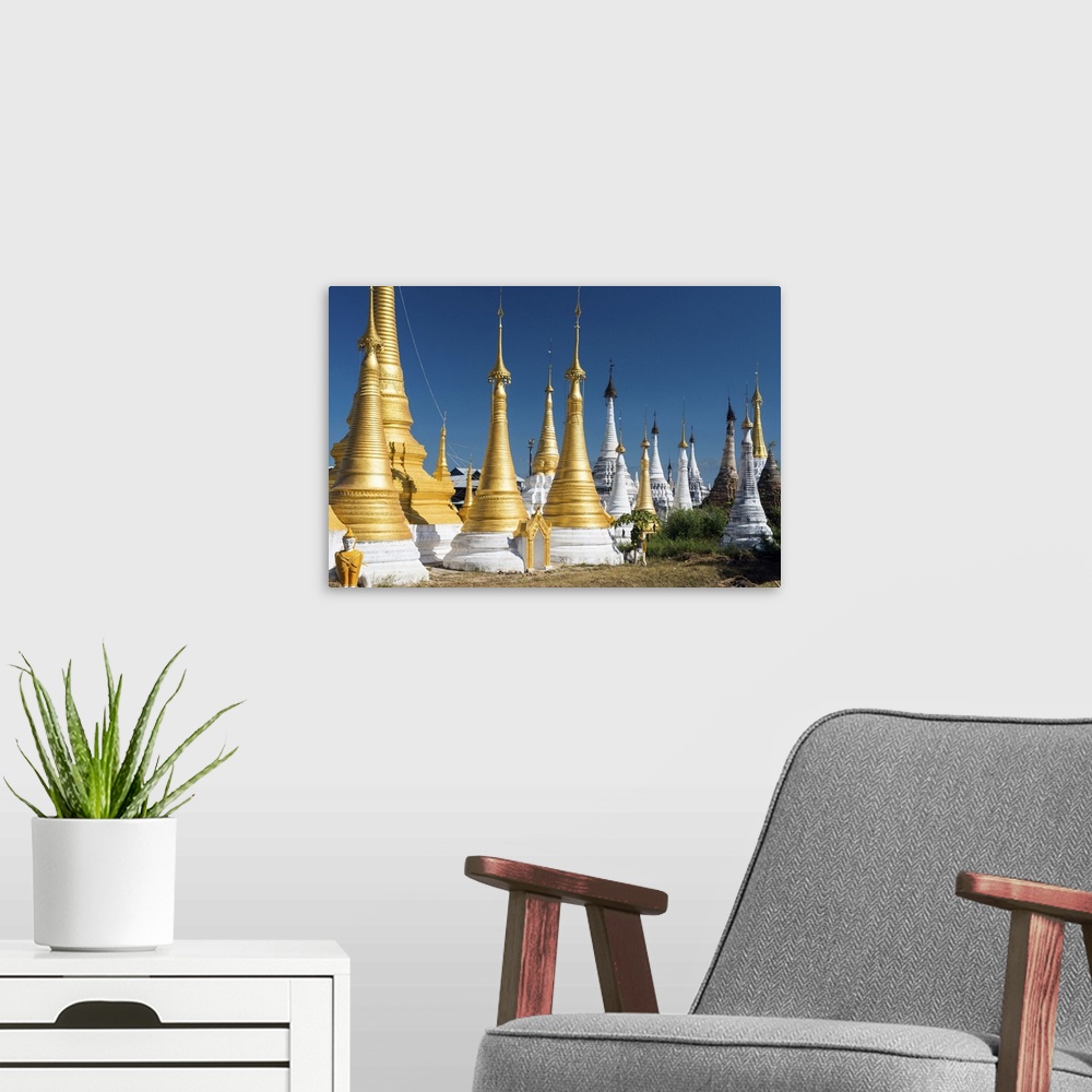 A modern room featuring Myanmar, Shan, Nyaungshwe, Pagodas at Inthein on Inle Lake.