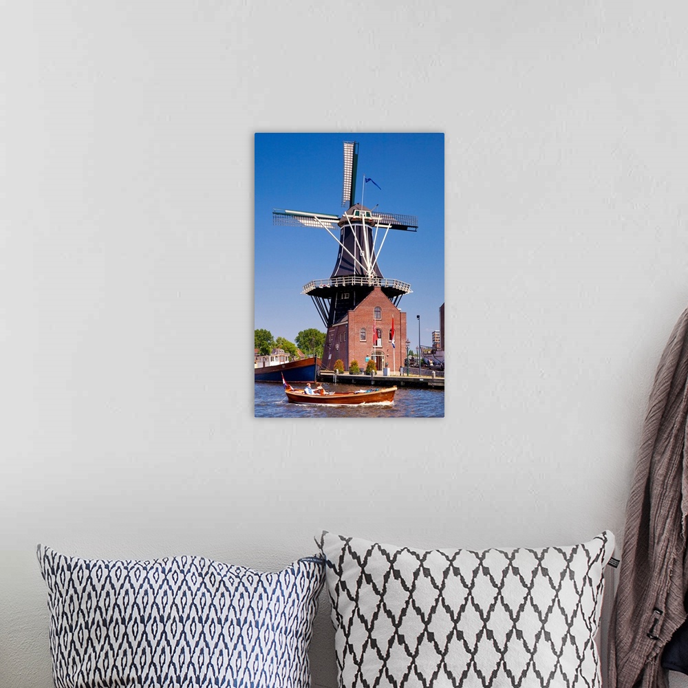 A bohemian room featuring Netherlands, North Holland, Benelux, Haarlem, De Adriaan windmill.