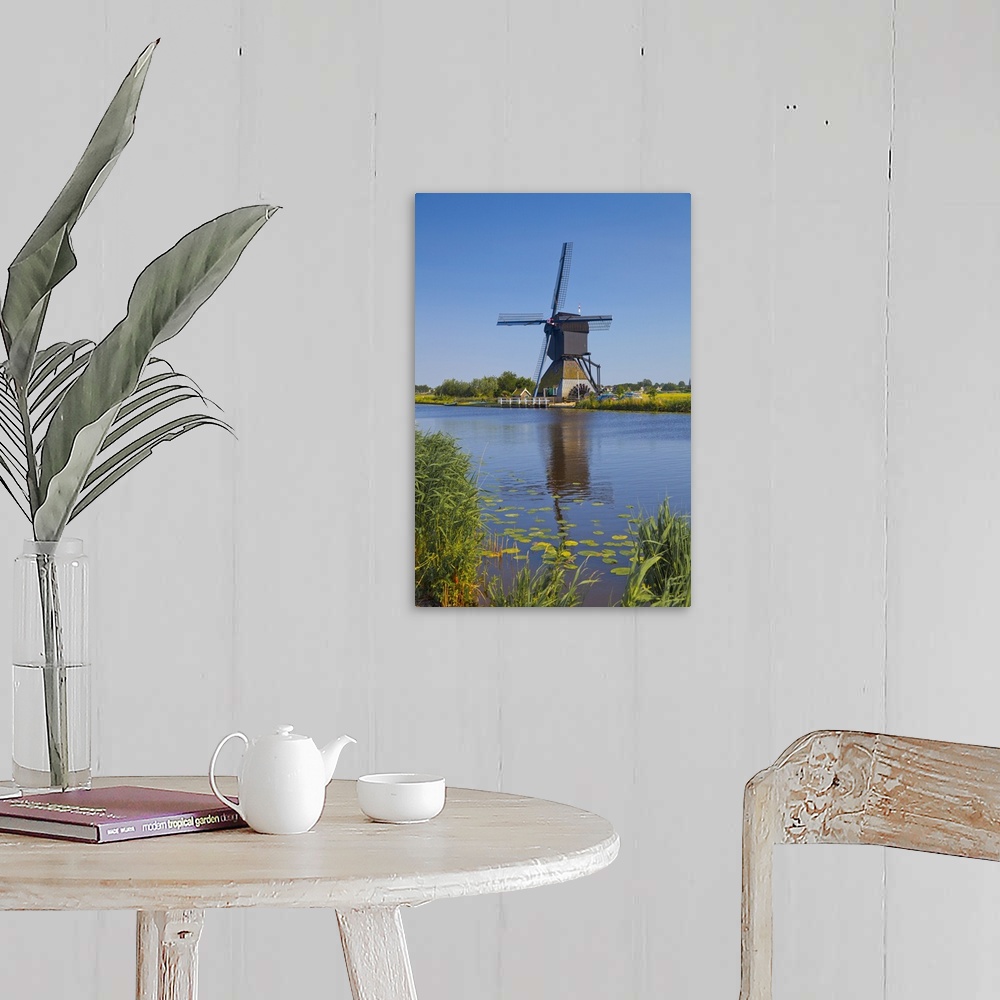 A farmhouse room featuring Netherlands, South Holland, Benelux, Kinderdijk, Windmills and canal.