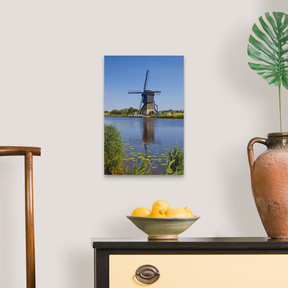 A traditional room featuring Netherlands, South Holland, Benelux, Kinderdijk, Windmills and canal.