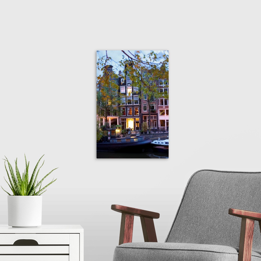 A modern room featuring Netherlands, Nederland, North Holland, Noord-Holland, Amsterdam, night view of the canal