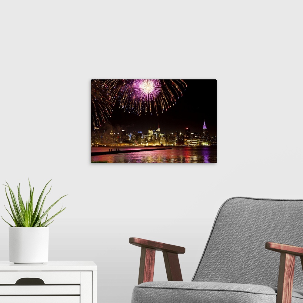 A modern room featuring USA, New Jersey, Hudson River, Fourth of July, Fireworks, Hoboken, Macy's Fourth of July Firework...