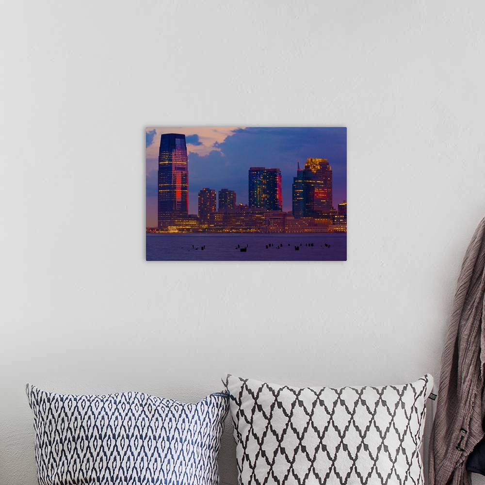 A bohemian room featuring USA, New Jersey, Hudson, View from Manhattan in the evening.