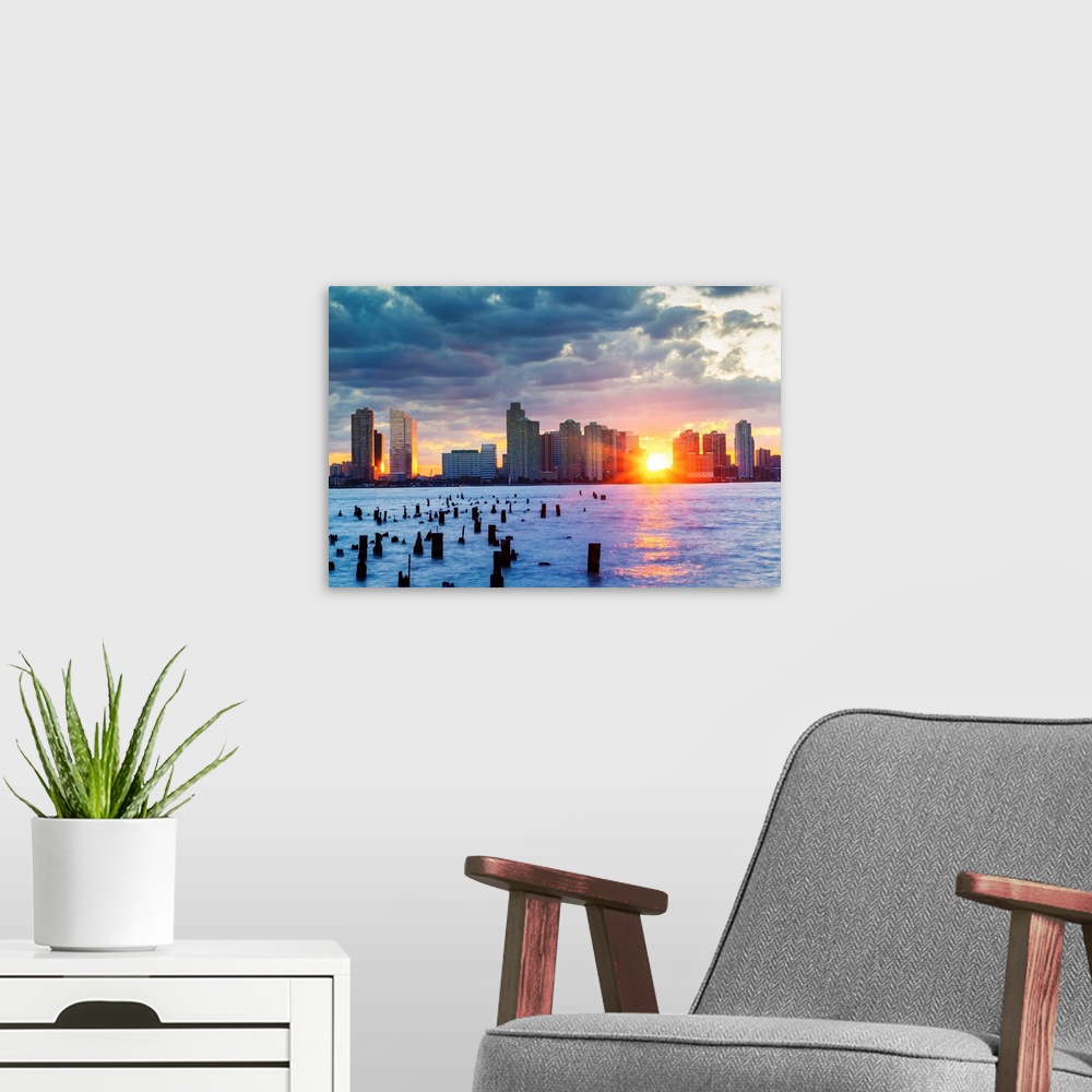 A modern room featuring New Jersey, Jersey City skyline seen from Manhattan.