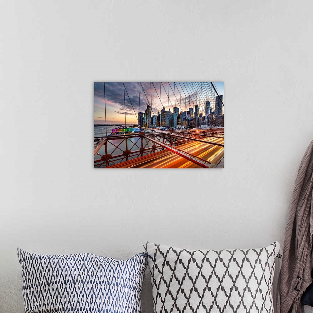 A bohemian room featuring New York City, Brooklyn Bridge, Lower Manhattan views seen through suspension wire..