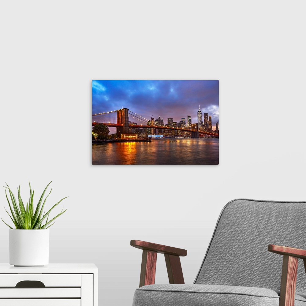 A modern room featuring New York City, Brooklyn, Brooklyn Bridge Park, Bridge with Jane's Carousel and Lower Manhattan in...