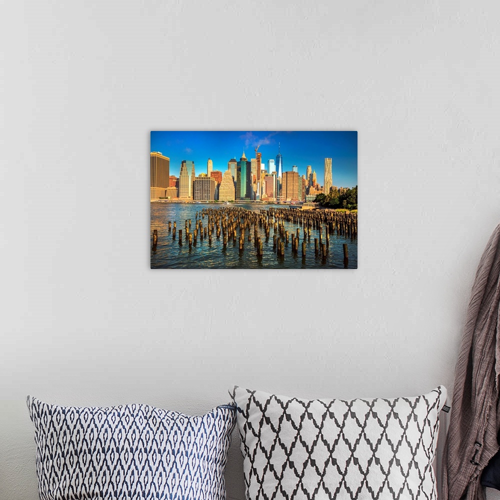 A bohemian room featuring New York City, Brooklyn, Brooklyn Bridge Park, wooden piles, Lower Manhattan Financial District s...