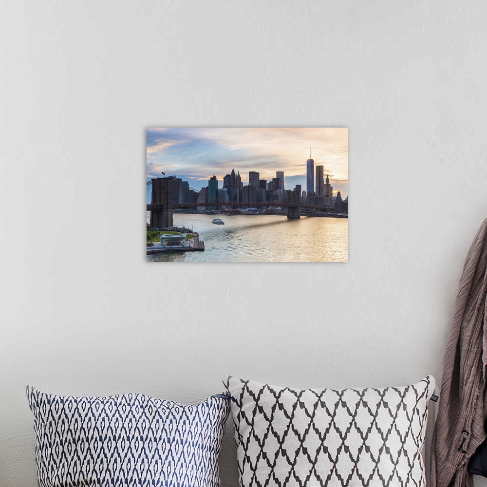 A bohemian room featuring USA, New York City, Brooklyn, Dumbo, Brooklyn Bridge, Manhattan skyline at sunset.