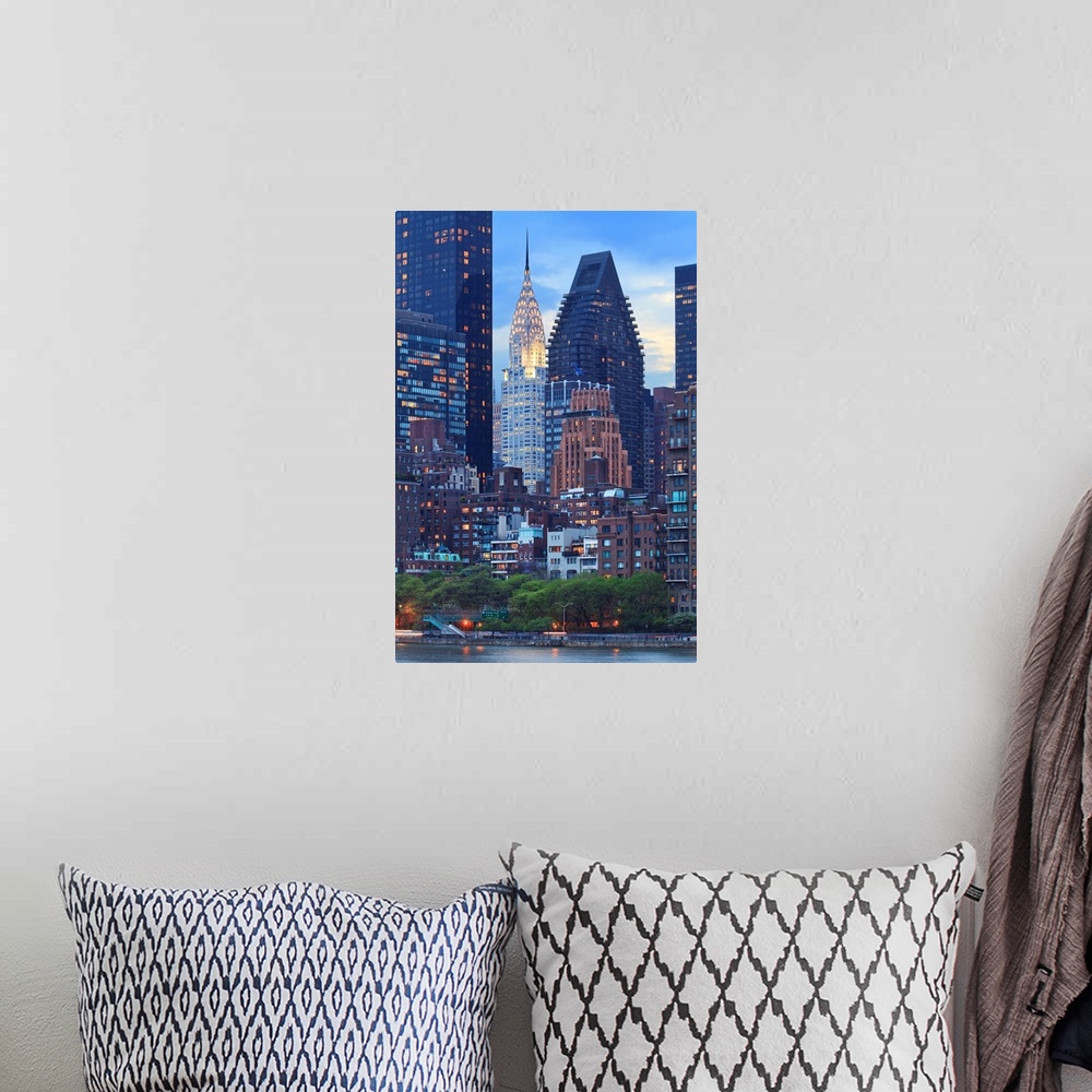 A bohemian room featuring USA, New York City, Manhattan, Midtown, Chrysler Building, View towards Manhattan at dusk from Ro...