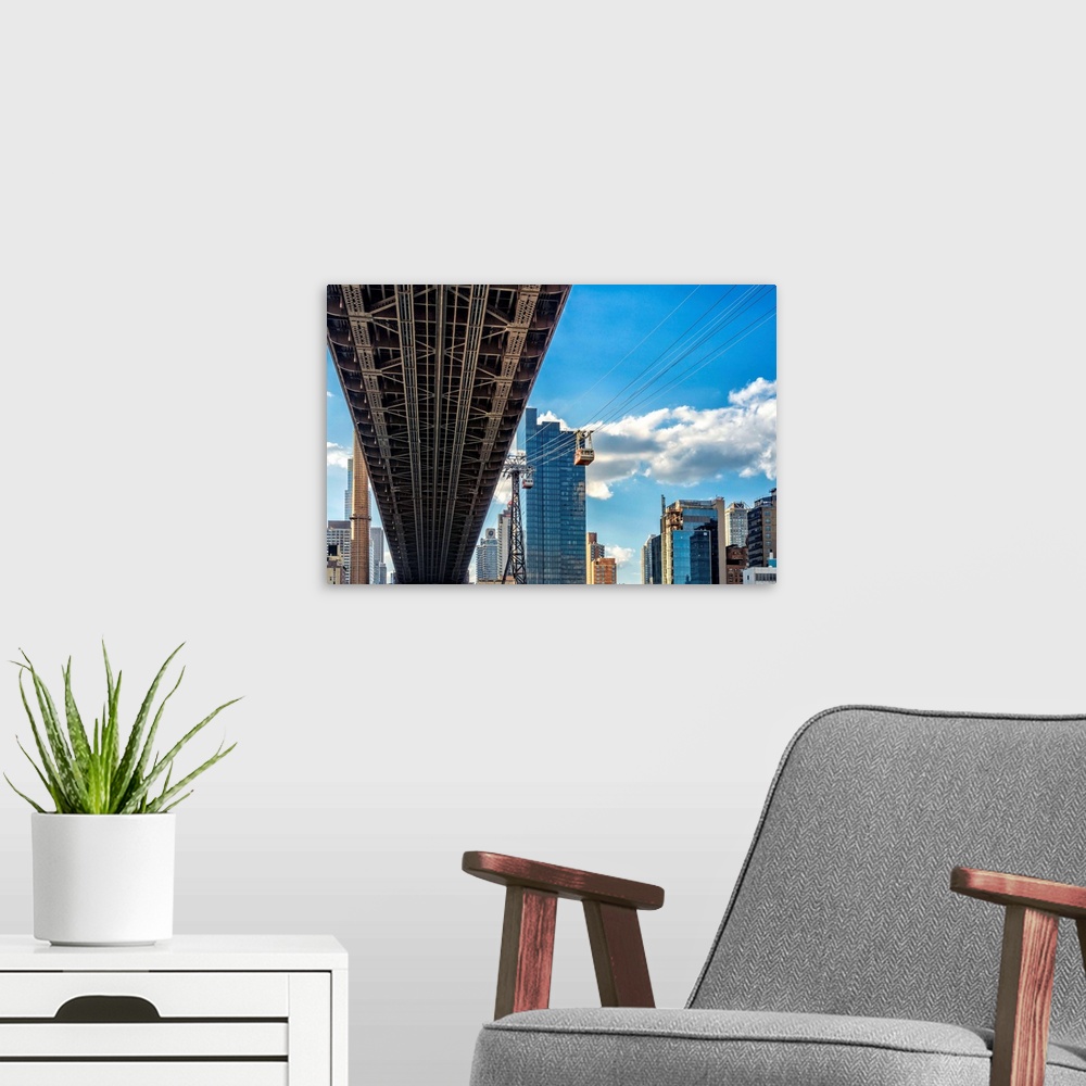 A modern room featuring New York, NYC, City skyline and Queensboro Bridge viewed from Roosevelt Island.