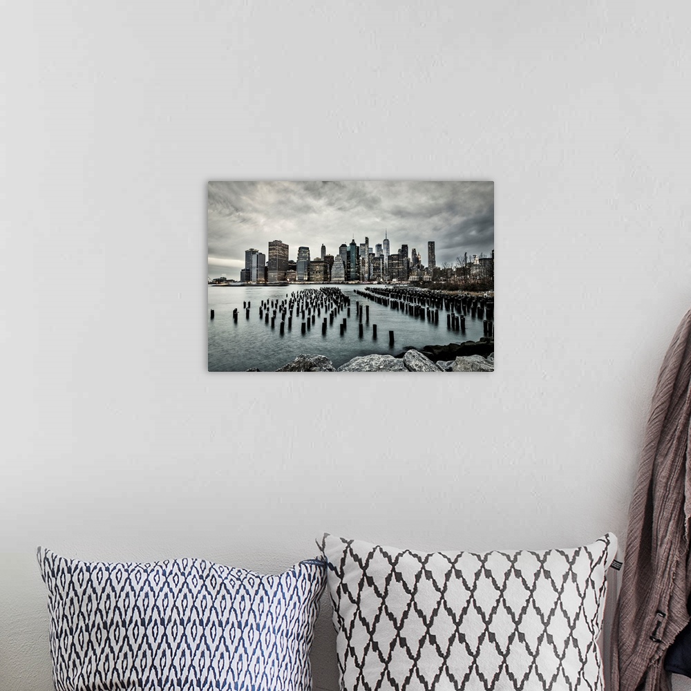 A bohemian room featuring New York City, downtown skyline seen from Brooklyn.