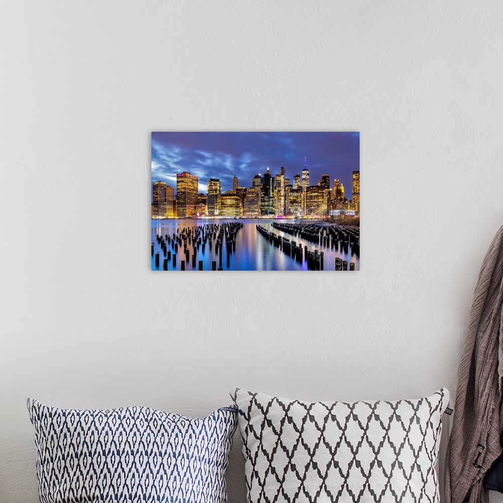 A bohemian room featuring New York City, downtown skyline seen from Brooklyn.