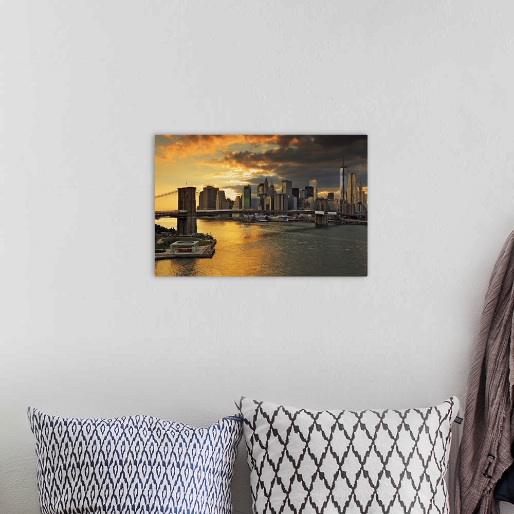 A bohemian room featuring USA, New York City, East River, Manhattan, Brooklyn Bridge, Downtown skyline at sunset, view from...