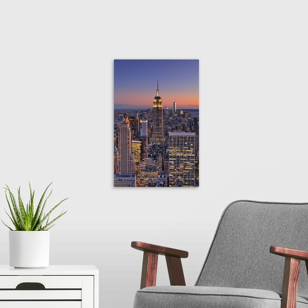 A modern room featuring USA, New York City, Manhattan, Midtown, Empire State Building, Midtown cityscape from Top of the ...