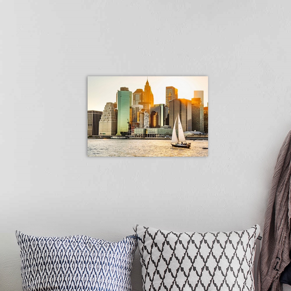 A bohemian room featuring New York City, Lower Manhattan financial district and sailboat viewed from Brooklyn..