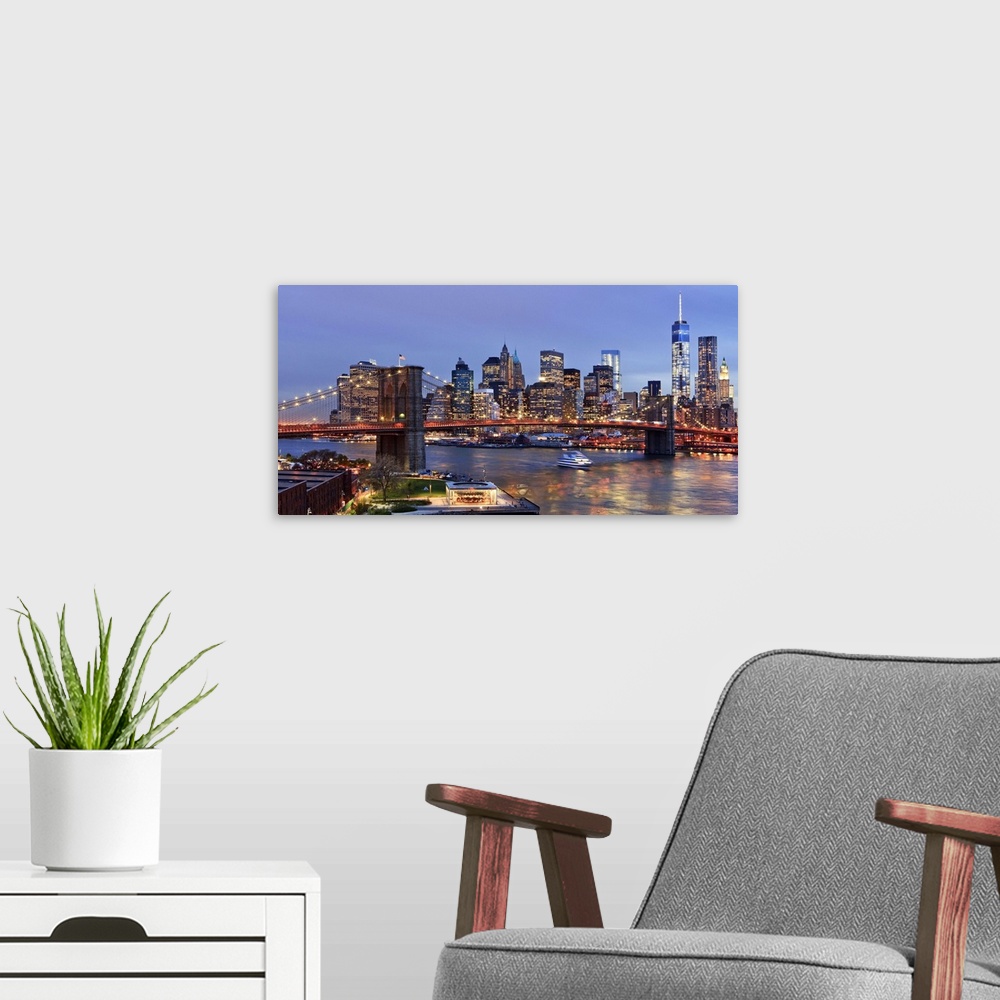 A modern room featuring USA, New York City, East River, Manhattan, Brooklyn Bridge, Downtown skyline with the Freedom Tow...