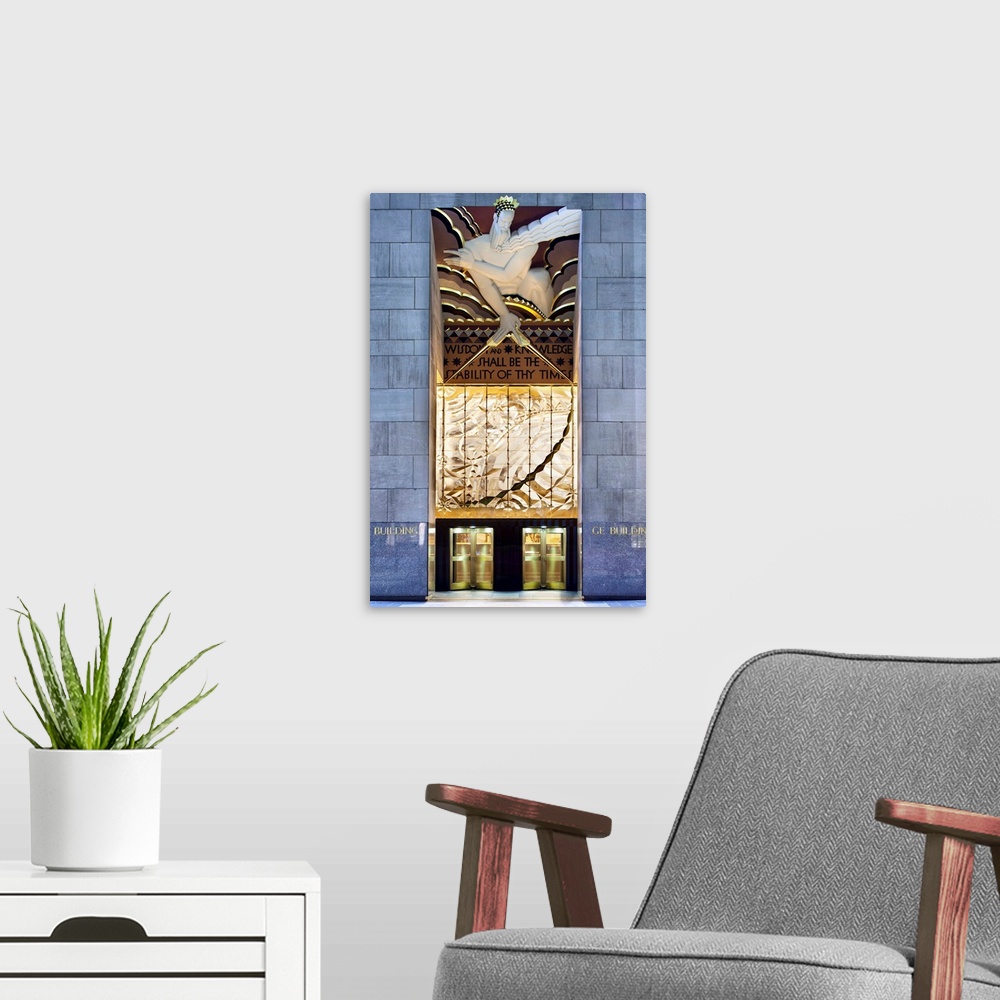 A modern room featuring USA, New York City, Manhattan, Midtown, Rockefeller Center, The Art Deco artwork at the entrance ...