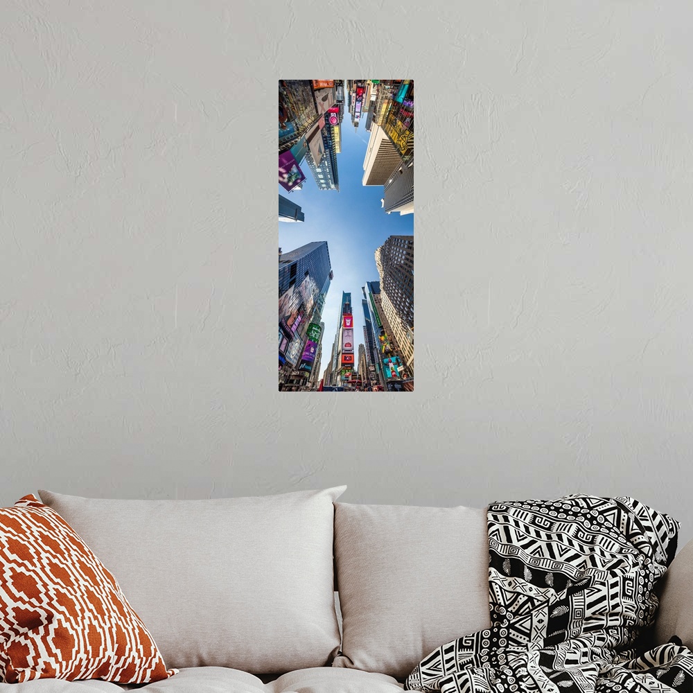A bohemian room featuring USA, New York City, Manhattan, Midtown, Times Square, View of skyscrapers from street level.