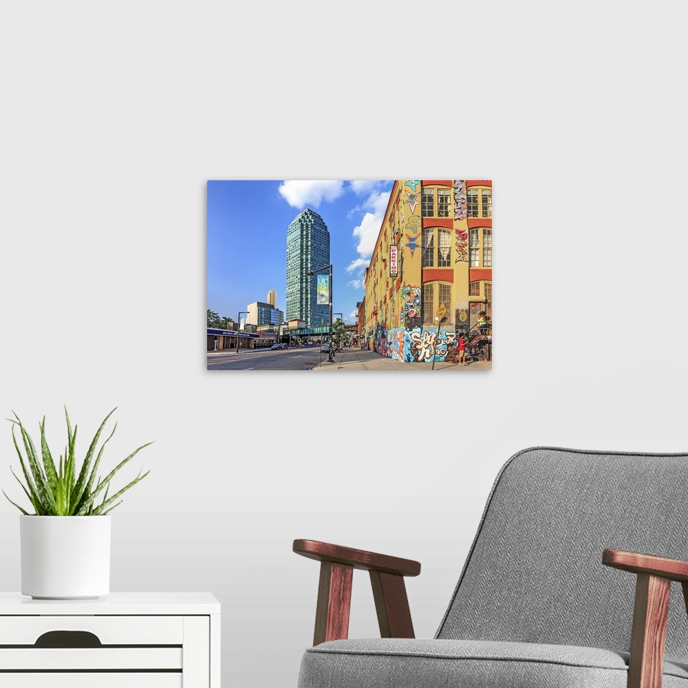 A modern room featuring New York, Long Island City, Graffiti, 5 Pointz Aerosol Art Center, and view of Citicort building.