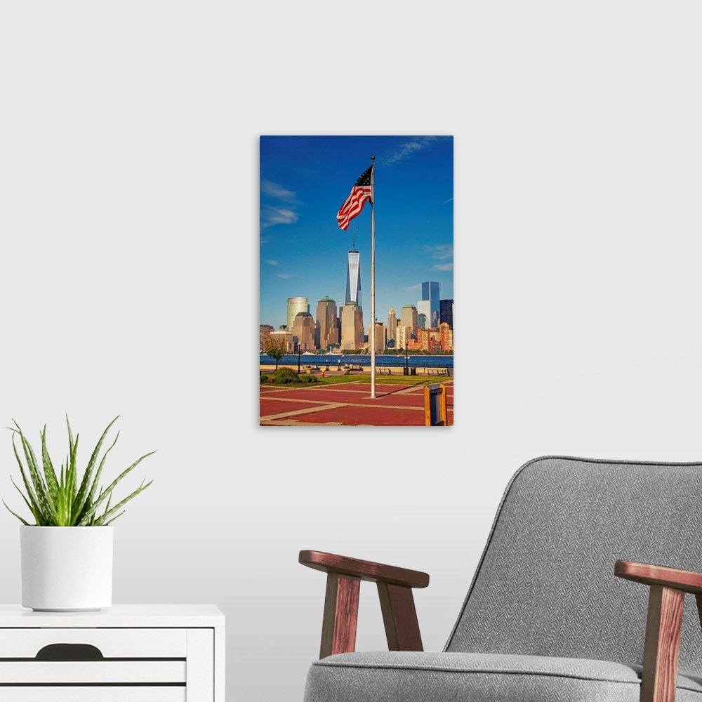 A modern room featuring New York, Lower Manhattan and Freedom Tower seen from Liberty State Park.