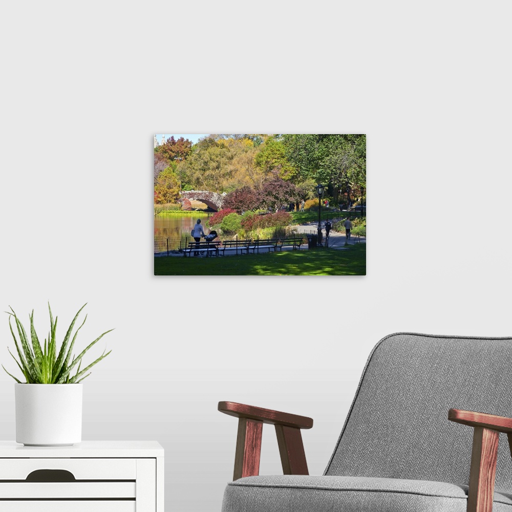 A modern room featuring New York, New York City, Central Park, wandering path around The Pond