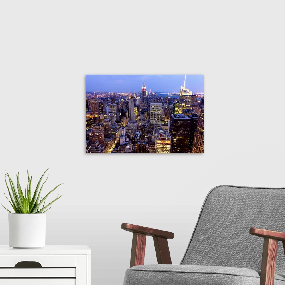 A modern room featuring New York, New York City, Empire State Building viewed from Top of the Rock