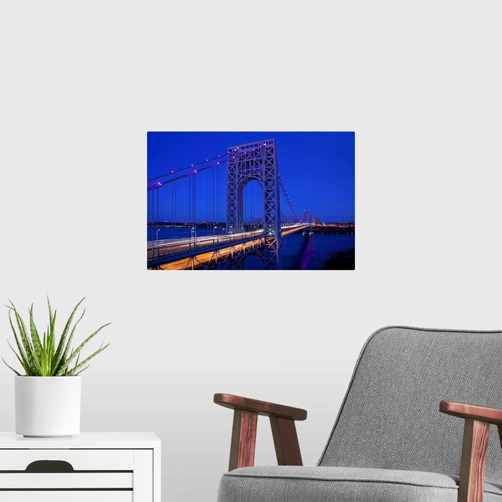 A modern room featuring New York, NYC, George Washington Bridge, view from New Jersey at night