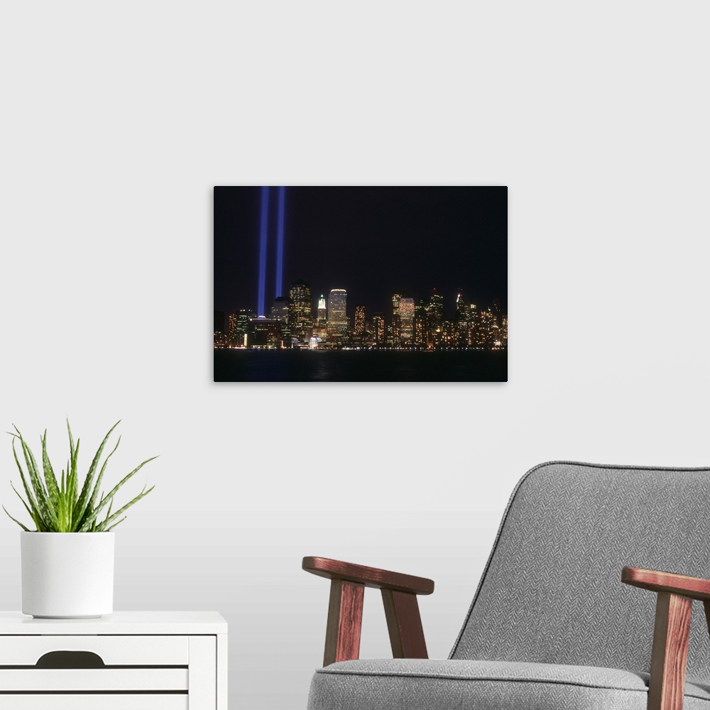 A modern room featuring New York State, Manhattan, NYC, Tribute in Light to the fallen Twin Towers