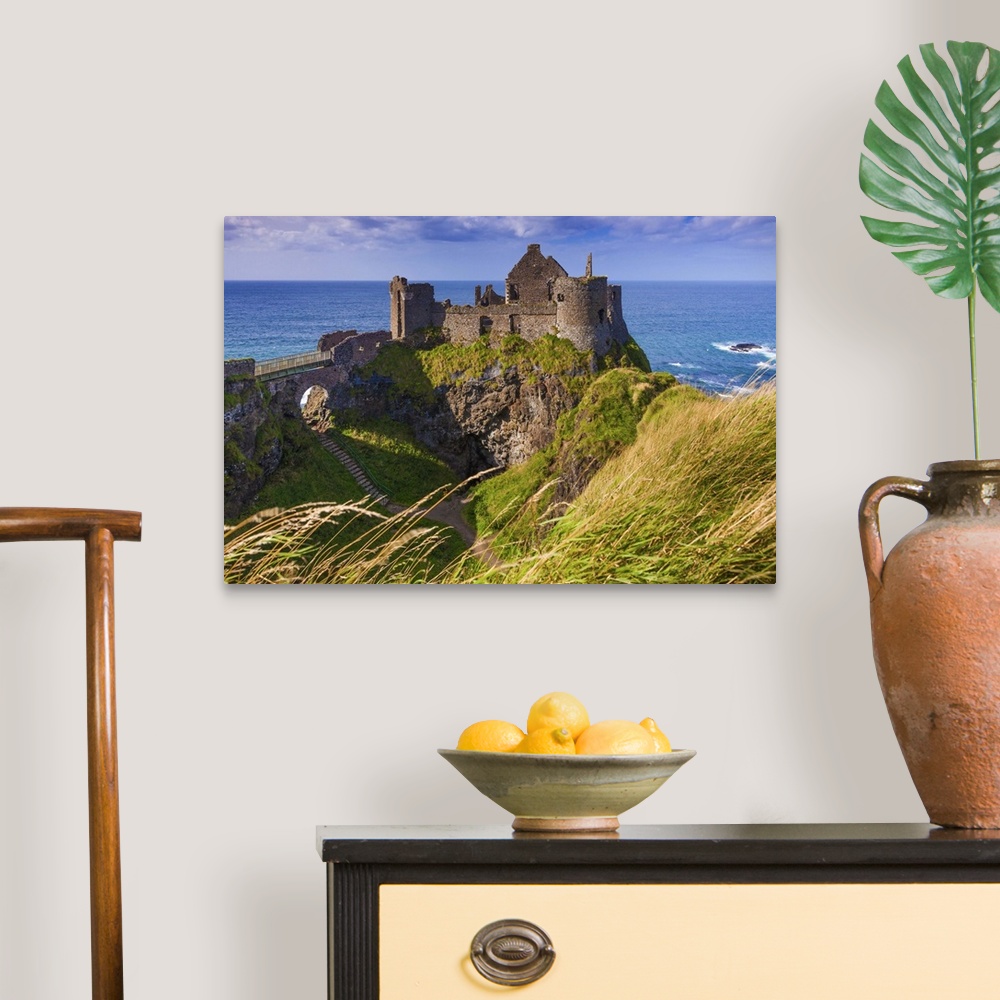 A traditional room featuring UK, Northern Ireland, Great Britain, Antrim, Dunluce Castle ruins on a cliff top near Bushmills v...
