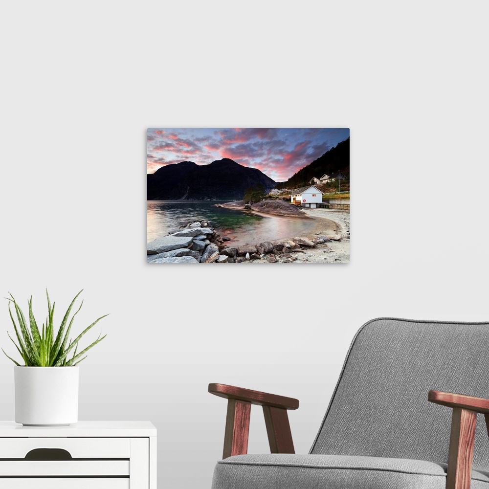 A modern room featuring Norway, Hordaland, Eidfjord, Scandinavia, Sunset over the famous fjord.