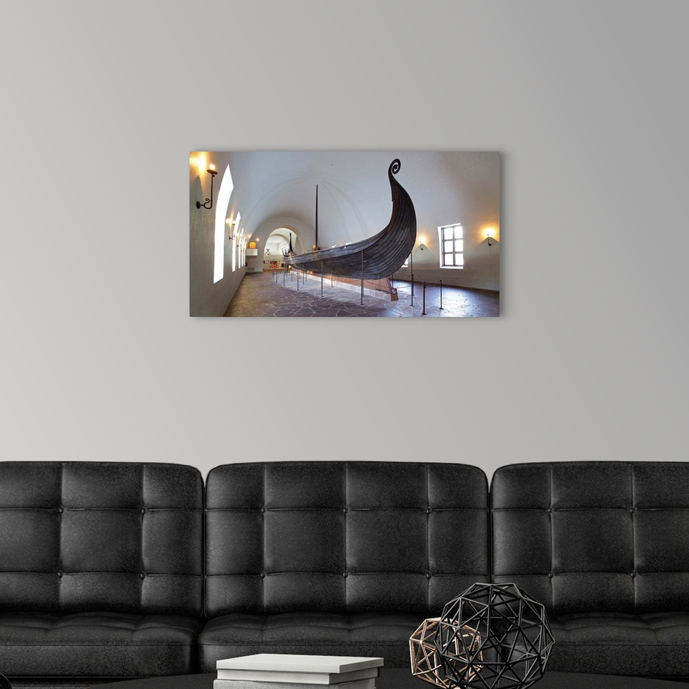 A modern room featuring Norway, Oslo, Viking Ship Museum, The Oseberg Ship, one of the best-preserved Viking longships, b...