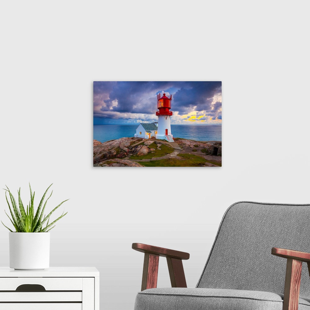 A modern room featuring Norway, Vest-Agder, Lindesnes, Lindesnes Fyr Lighthouse at sunset.