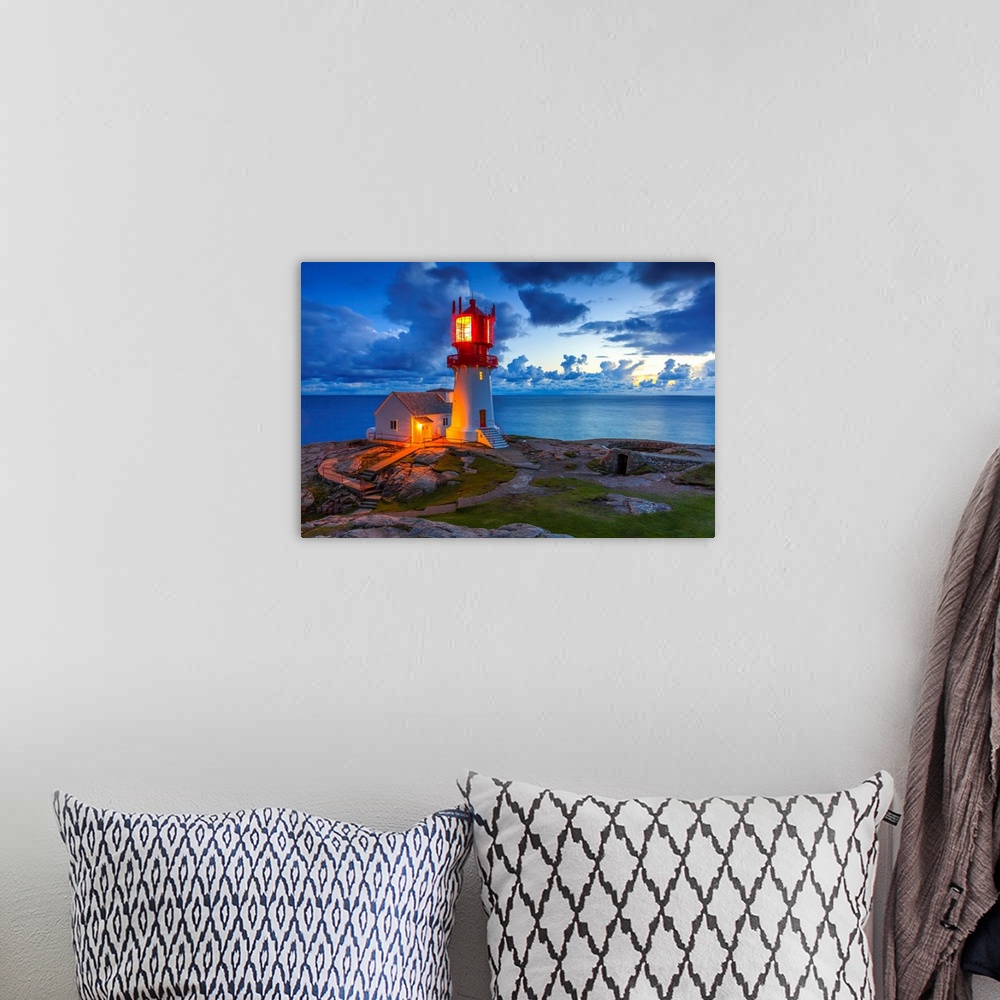 A bohemian room featuring Norway, Vest-Agder, Scandinavia, Lindesnes, Lindesnes Fyr Lighthouse at sunset.