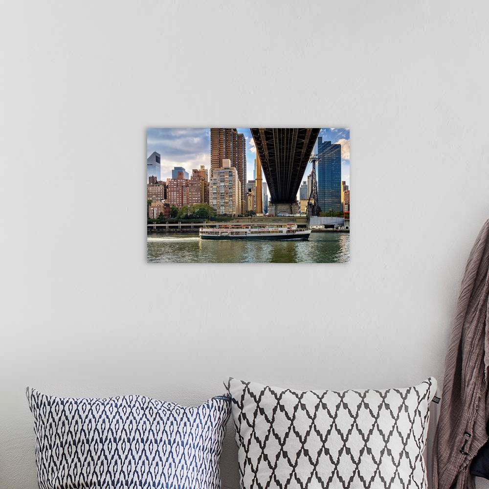 A bohemian room featuring New York, NYC, City skyline, Queensboro Bridge, cruise ship, viewed from Roosevelt Island.