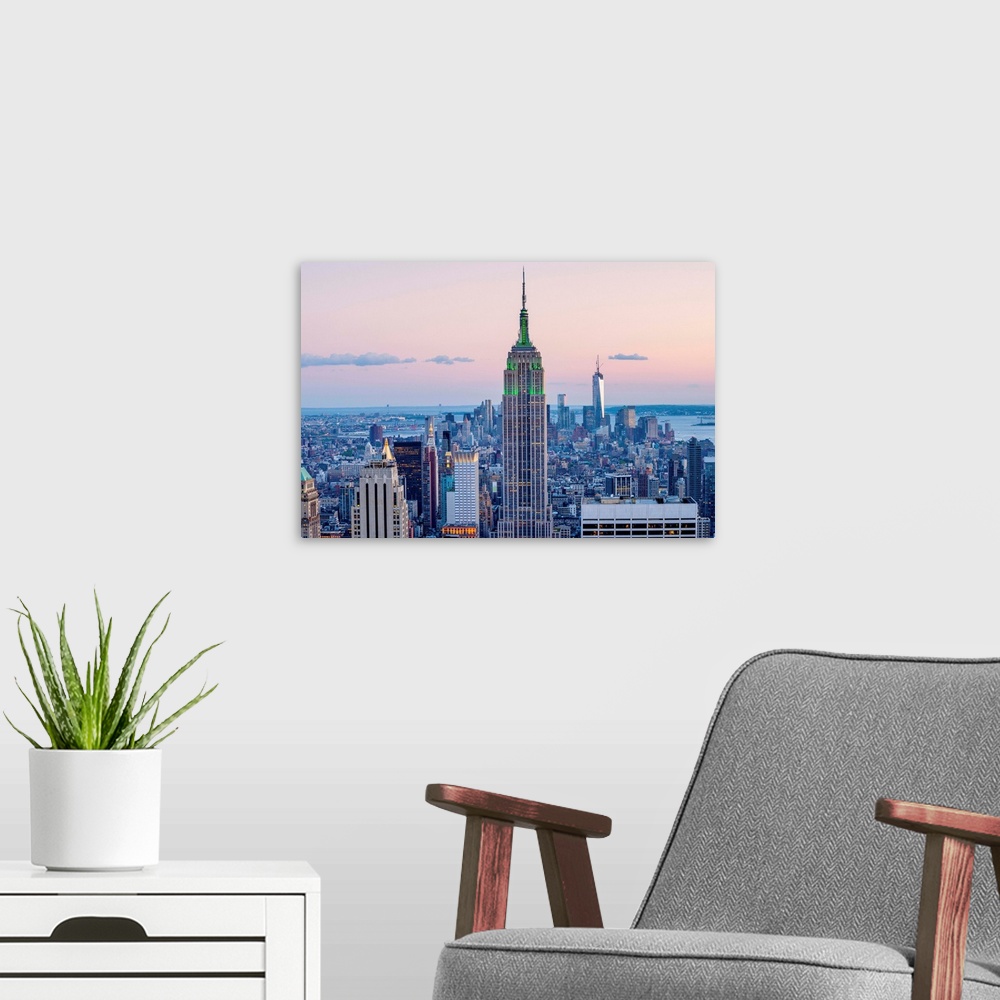 A modern room featuring New York, New York City, Manhattan, Rockefeller Center, Empire State Building and south Manhattan...