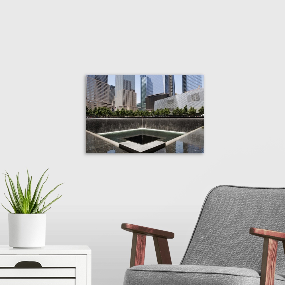 A modern room featuring NYC, Manhattan, The South Pool of the National 9/11 Memorial, Ground Zero