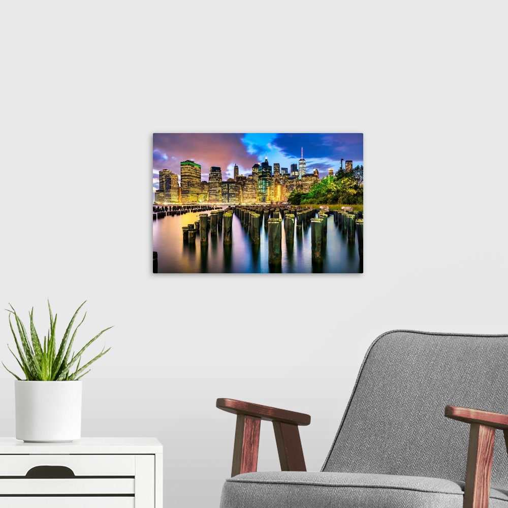 A modern room featuring NYC, NY skyline from Brooklyn with pylons.