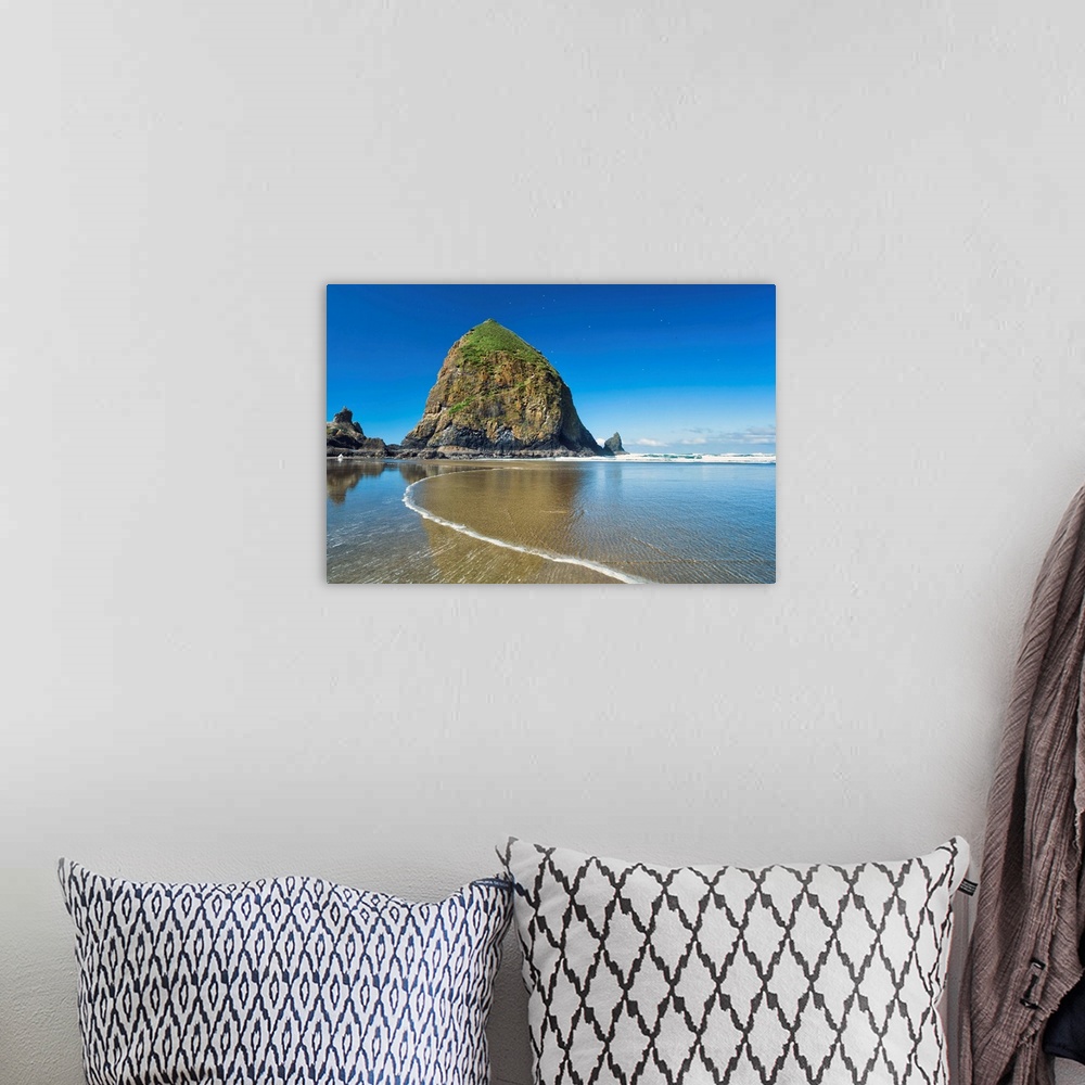 A bohemian room featuring USA, Oregon, Pacific ocean, Hay Stack Rock at low tide, Cannon Beach.