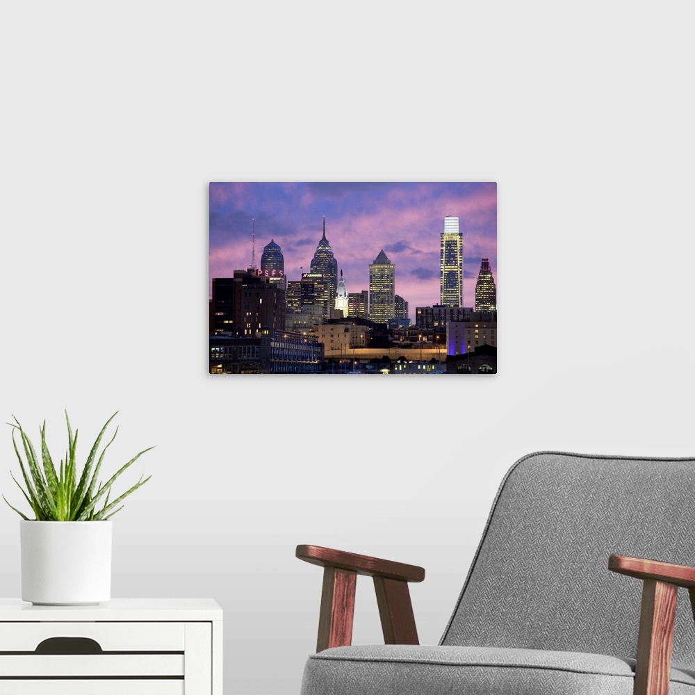 A modern room featuring USA, Pennsylvania, Philadelphia, Philadelphia's skyline over Delaware River.