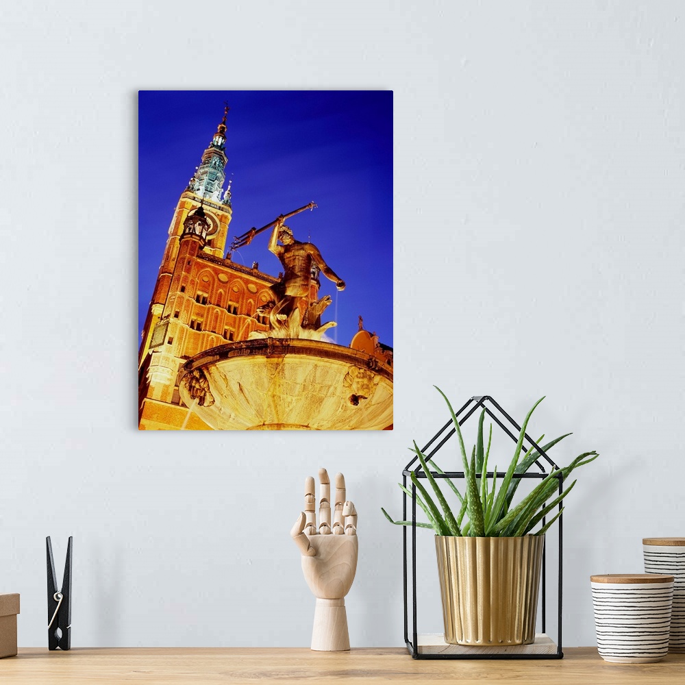 A bohemian room featuring Poland, Pomorskie, Gdansk, Neptune fountain and Town Hall