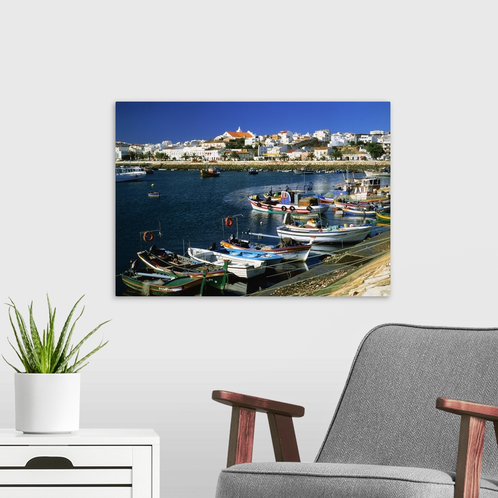 A modern room featuring Portugal, Algarve, Lagos, harbor and town