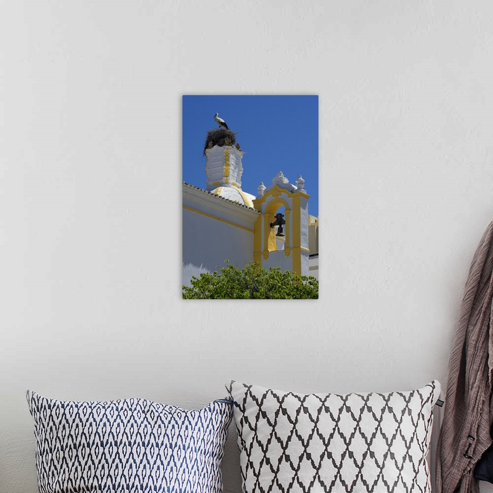 A bohemian room featuring Portugal, Faro, a stork's nest on the Capela de Santo Amaro church in Faro