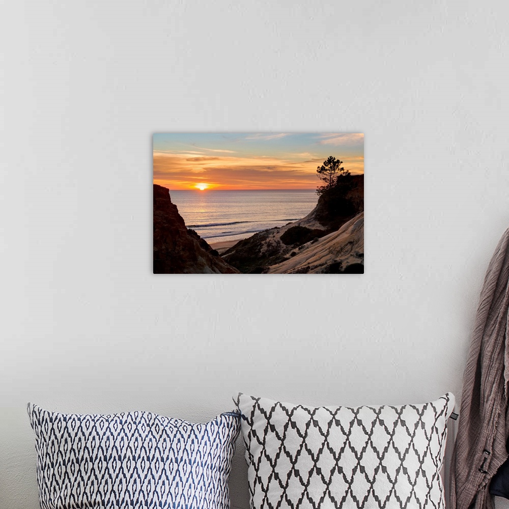 A bohemian room featuring Portugal, Faro, Albufeira, Algarve, Praia da Falesia beach at sunset.