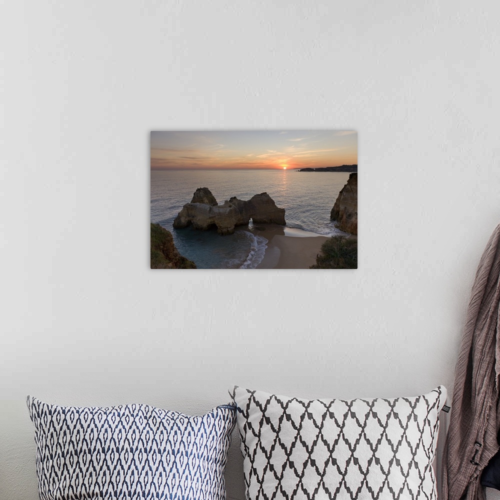 A bohemian room featuring Portugal, Faro, Algarve, Praia da Rocha, Rock formations at sunset