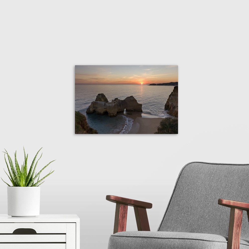 A modern room featuring Portugal, Faro, Algarve, Praia da Rocha, Rock formations at sunset