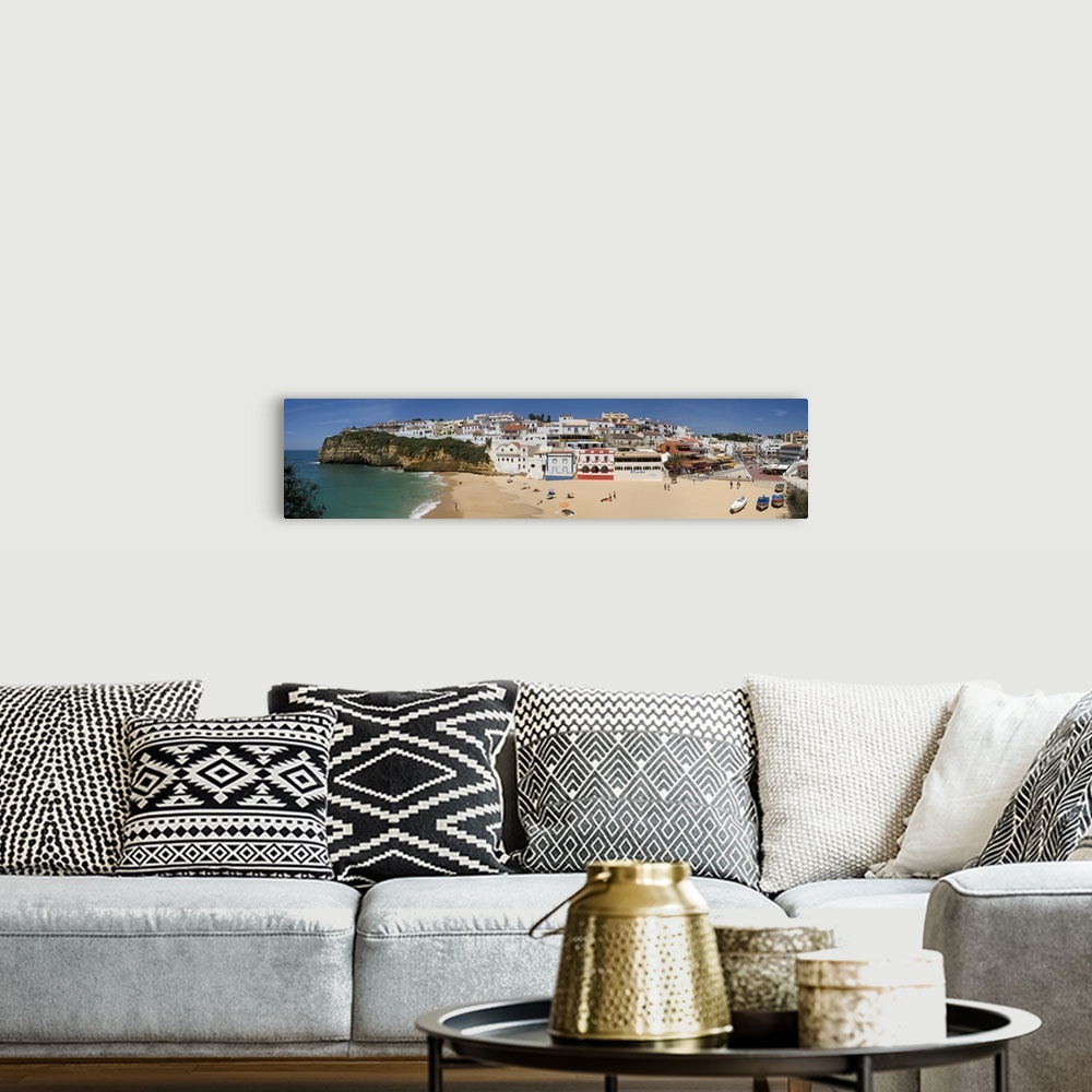 A bohemian room featuring Portugal, Faro, Algarve, Praia do Carvoeiro village and beach