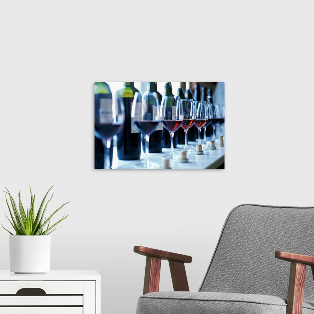 A modern room featuring Portugal, Oporto, Bottles of Ramos Pinto, red wine