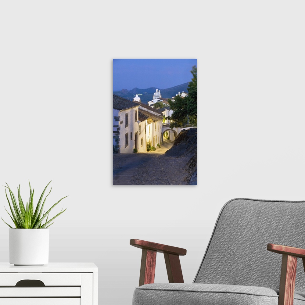 A modern room featuring Portugal, Portalegre, Medieval town of Marvao street scene at night